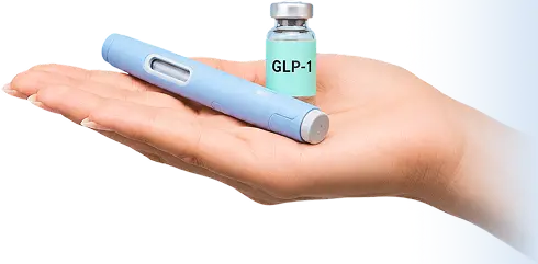 Hand holding GLP-1 weight loss medication